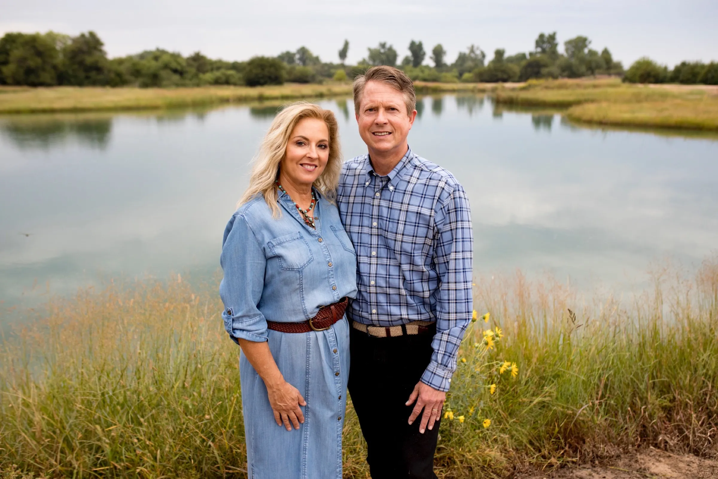 Roger and Laina Marshall together at the family pond outside Great Bend.